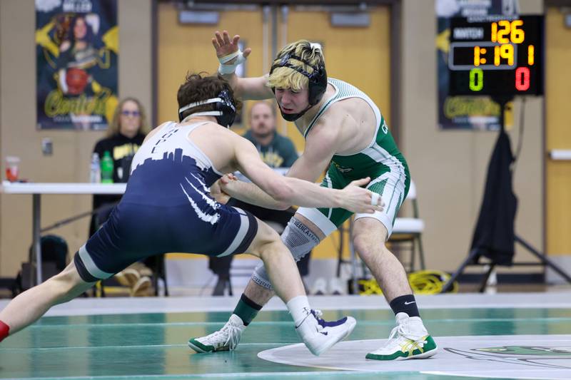 Coal City's Owen Petersen wrestles Chicago Hope Academy's Obadiah Willis in the 126-pound championship match during the IHSA Class 1A Coal City Sectional on Saturday, Feb. 14, 2026.