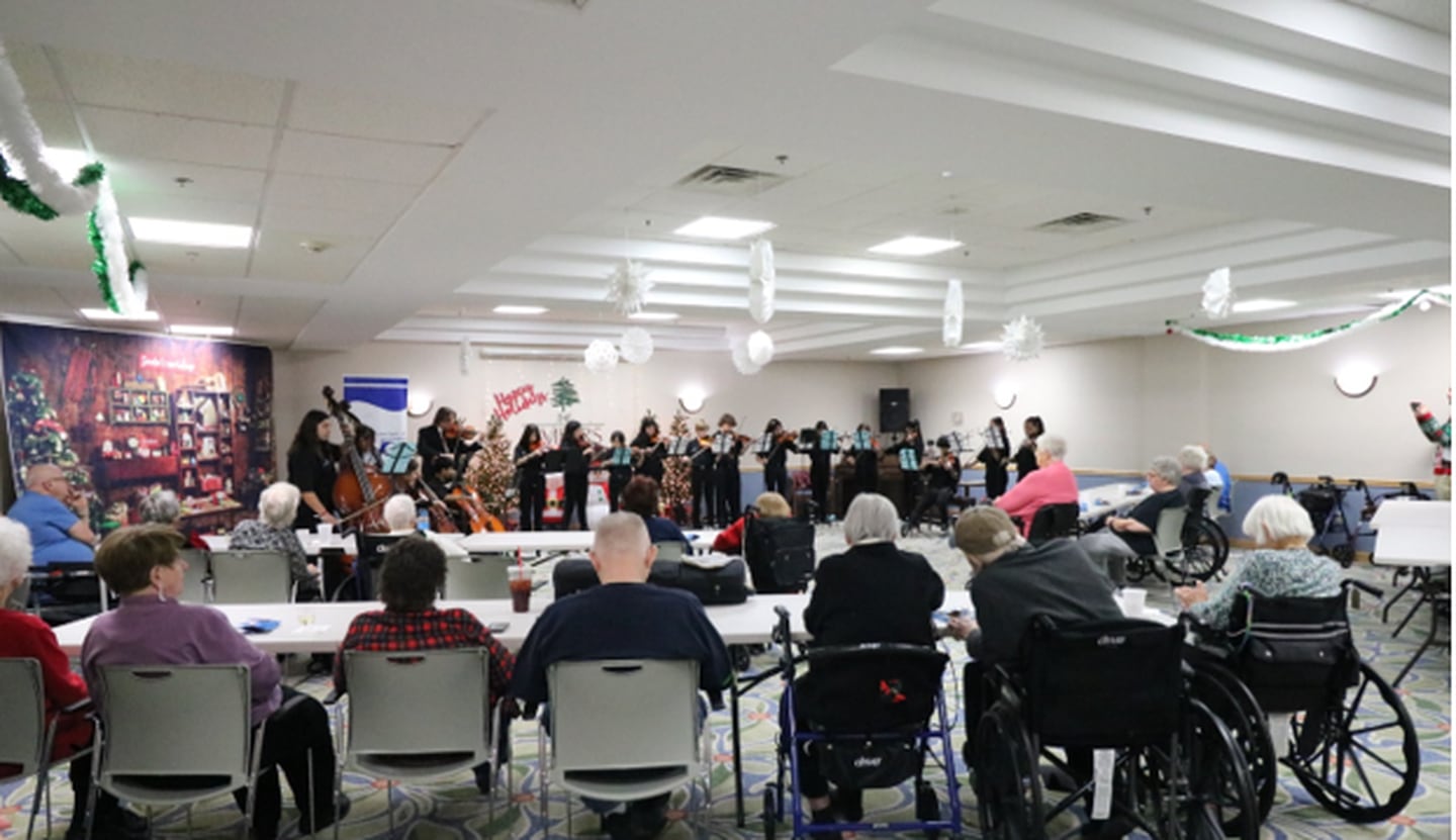 Select Joliet area locations enjoyed live holiday music on Dec. 15 performed by 18 Hufford Junior High orchestra students, including The Timbers of Shorewood (pictured).