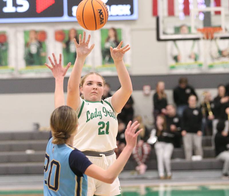 Seneca's Camryn Stecken lets go of a shot over Marquette's Kaitlyn Davis on Thursday, Feb. 5, 2026 at Seneca High School.