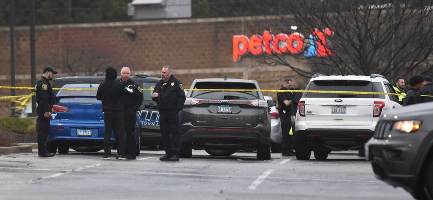 Police work the scene of a fatal shooting the evening of Wednesday, April 13, 2022, in the parking lot of Esporta Fitness on the 400 block of North 8th Street in West Dundee.