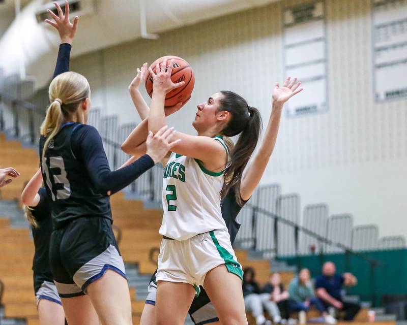 York's Anna Flosa (2) puts up a shot in their York Thanksgiving Tournament game between Oswego East at York on Monday, Nov 18, 2024  in Elmurst.