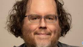 Joliet Public Library pays tribute to legacy of children’s librarian Mike Rank