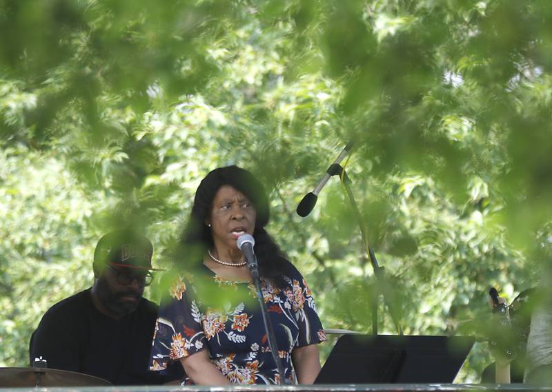 Gloria Van Hof talks about the Underground Railroad in McHenry County during McHenry County’s first Juneteenth celebration on Saturday, June 17, 2023, at the Historic Woodstock Square. The Juneteenth festival featured McHenry County College graduate Rodney Katushabe and Pastor Norval Brown of the Cary United Methodist Church, along with music from gospel singer Darlene Benton and jazz musician Ken Davis.