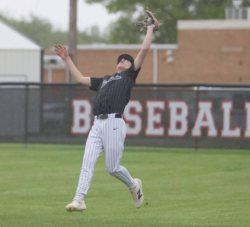 Woodland's Parker Hopkins makes a catch in right field on Tuesday, May 12, 2026 at Woodland High School.