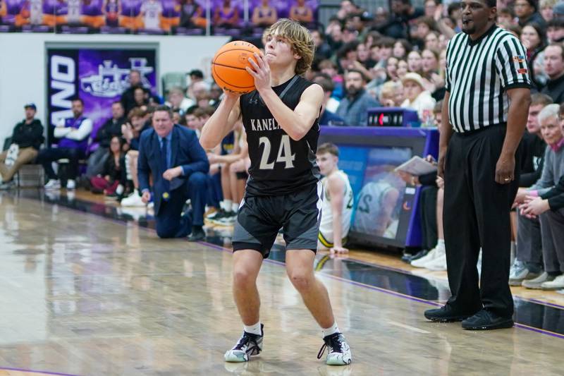 Kaneland’s Luke Reinert (24) shoots a three pointer against Yorkville Christian during a championship final basketball game in the 61st annual Plano Christmas Classic at Plano High School on Saturday, December 28, 2024.