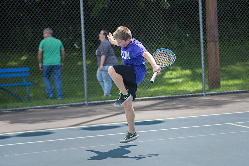 Cameron Foulker celebrates a point while playing in the 15 and under boys single tournament during the Emma Hubbs tennis classic in Dixon.