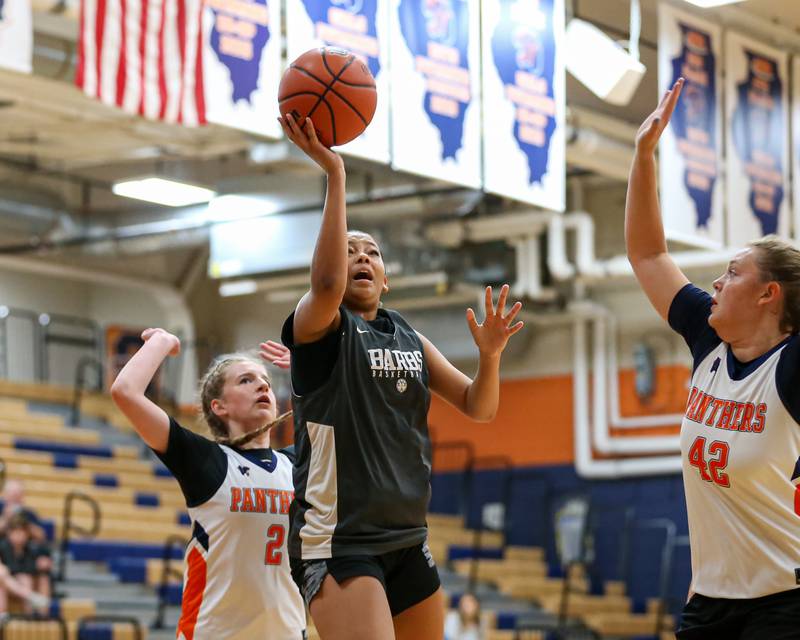 Dekalb's Alicia Johnson puts in a layup at the Oswego Girls Basketball Shootout . June 30, 2023.