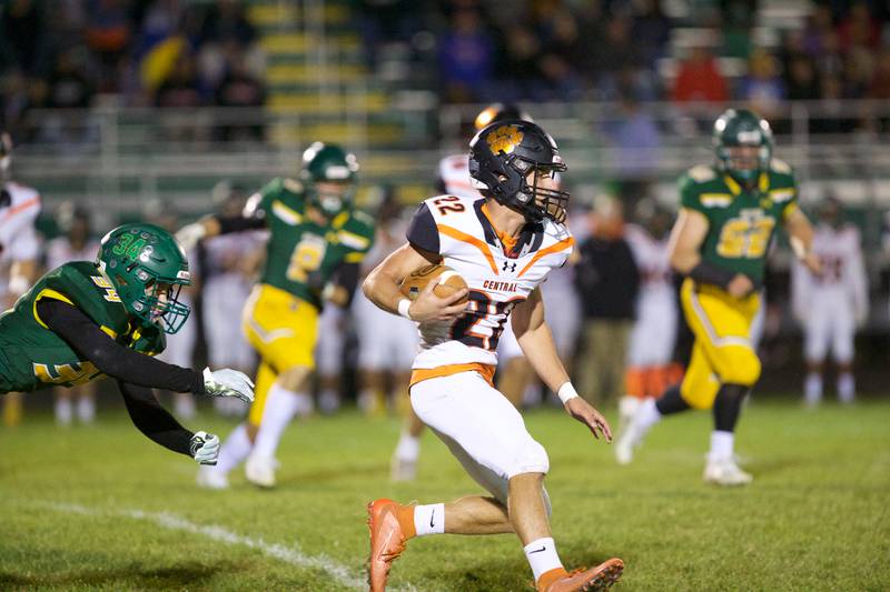 Crystal Lake Central's Vince Honer run for a gain against Crystal Lake South on Friday Sept.30,2022 in Crystal Lake.