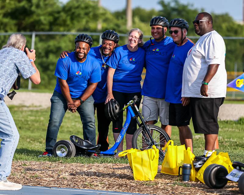 Team Comcast poses for pictures during the Great American Big Wheel Race.  July 22nd, 2023