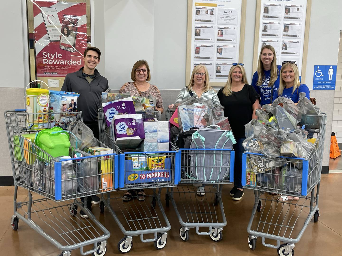 Carus employees shopped for school supplies.