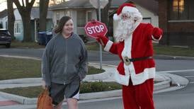 Photos: Santa visits Lincoln school in La Salle to be the crossing guard