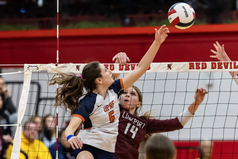 Oak Park-River Forest's Erin Dwyer sets-up a teammate during a 4A Supersectional girls volleyball game against Lockport at Hinsdale Central on Nov. 10, 2025.