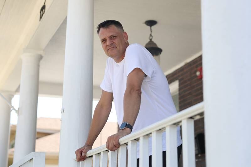 Matthew Celmer, who serve two tours in Iraq, poses for a photo outside the Joliet location for the Family and Friends Homeless Veterans Program on Wednesday, July 31, 2024 in Joliet.