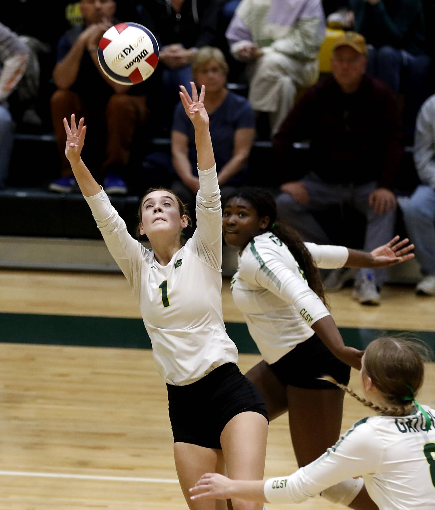 Crystal Lake South's Olivia Apt sets the ball during the IHSA Class 3A Crystal Lake South Sectional final volleyball match against Prairie Ridge on Thursday, Nov. 7, 2024, at Crystal Lake South High School.