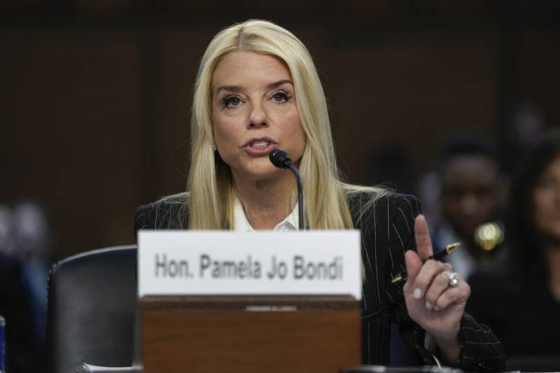 Pam Bondi, President-elect Donald Trump's choice to lead the Justice Department as attorney general, appears before the Senate Judiciary Committee for her confirmation hearing, at the Capitol in Washington, Wednesday, Jan. 15, 2025. (AP Photo/Ben Curtis)