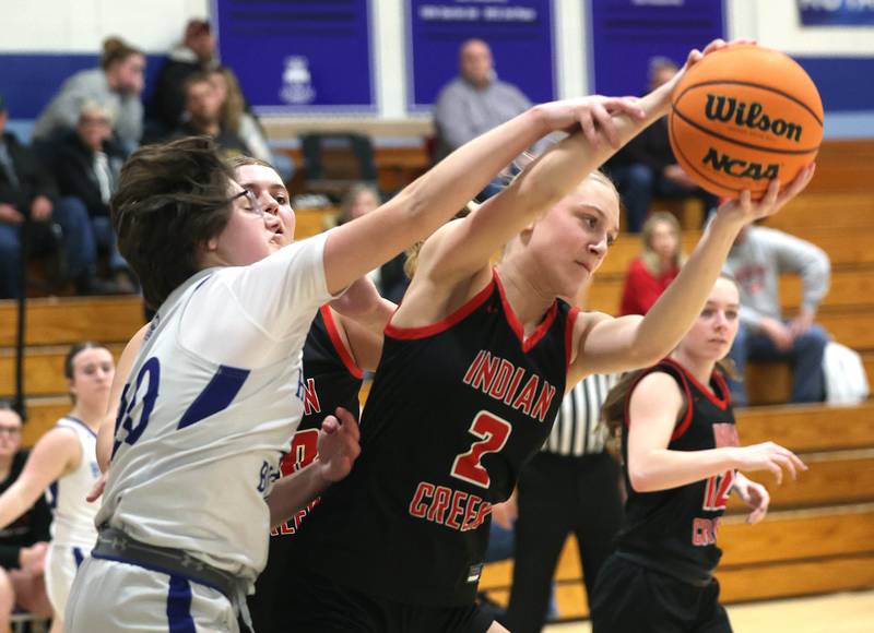 Indian Creek's Gretta Oziah grabs a rebound in front of Hinckley-Big Rock's Grace Hall during their game Thursday, Jan. 29, 2026, at Hinckley-Big Rock High School.