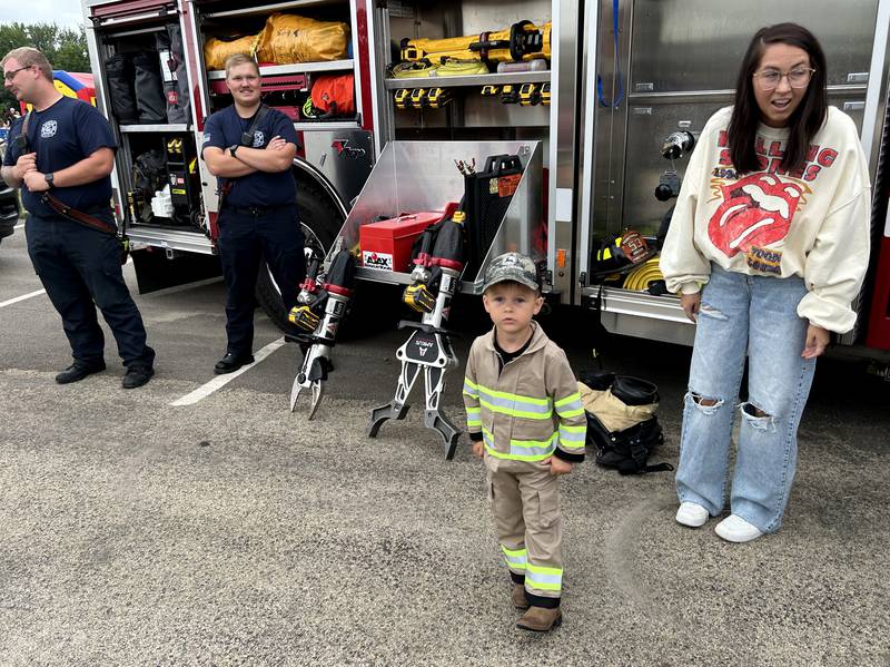 Cullen Vankirk, 3, and his mom, Lauren, of Oregon checked out one the Oregon firetrucks and equipment at National Night Out, hosted by the Oregon Police Department and Oregon Park District at River's Edge Experience in Oregon on Tuesday, Aug. 6, 2024.