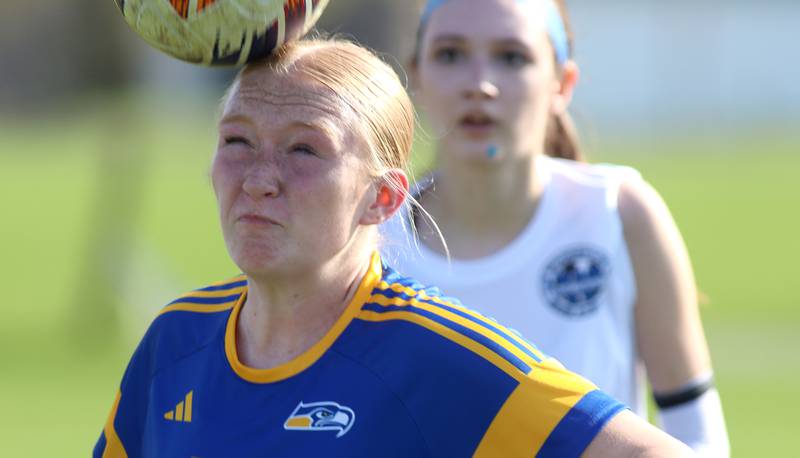Johnsburg’s Kayla Hiller corrals the ball against Woodstock in varsity soccer on Wednesday, April 23, 2025, at Johnsburg High School in Johnsburg.