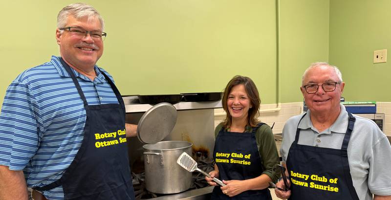 Rotary Club of Ottawa Sunrise members Mike Matteson (from left), Bobbi Roberson, and Gary Robinson