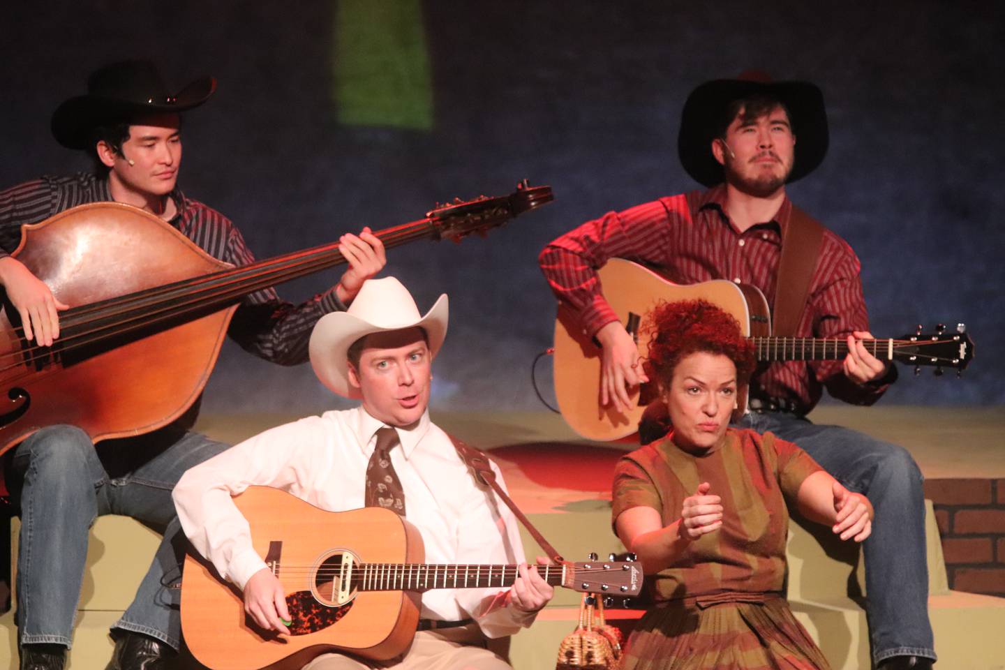 Lennon Hu, Chris Wren, Mia Giminez, and Kelan Smith perform in the Timber Lake Playhouse production of Hank Williams: Lost Highway running through Sunday at the Mount Carroll theater.