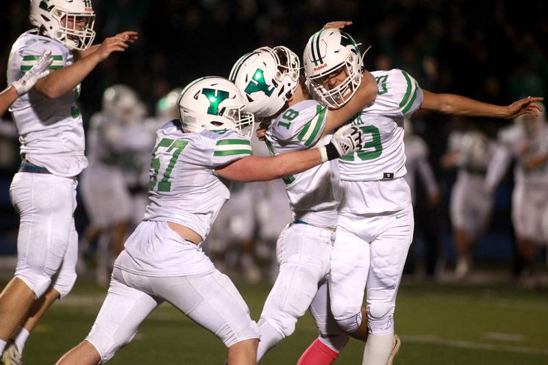 York players celebrate the game-winning field goal from kicker Damian Glodz (far right) during the Class 8A second round football playoff game against Lyons Township in Western Springs on Saturday, Nov. 4, 2023.