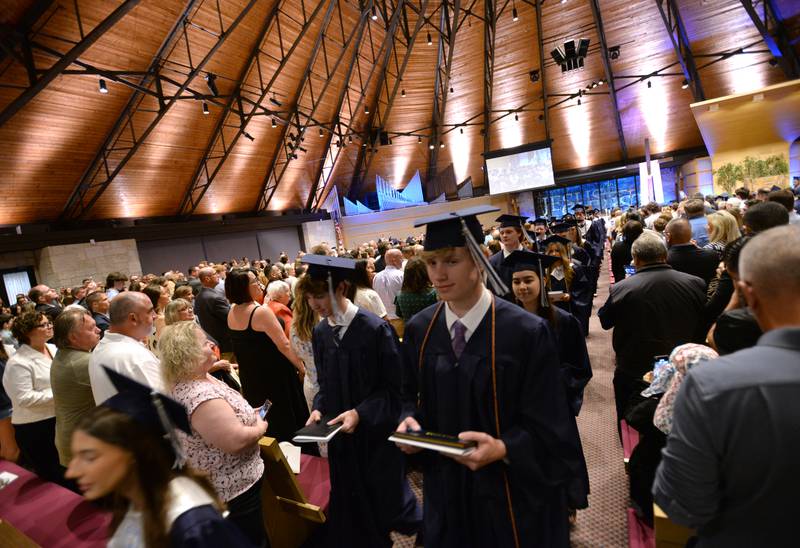 Nazareth Academy graduates make their exit during the mass and graduation held on Sunday, May 18, 2025 at Christ Church of Oak Brook.