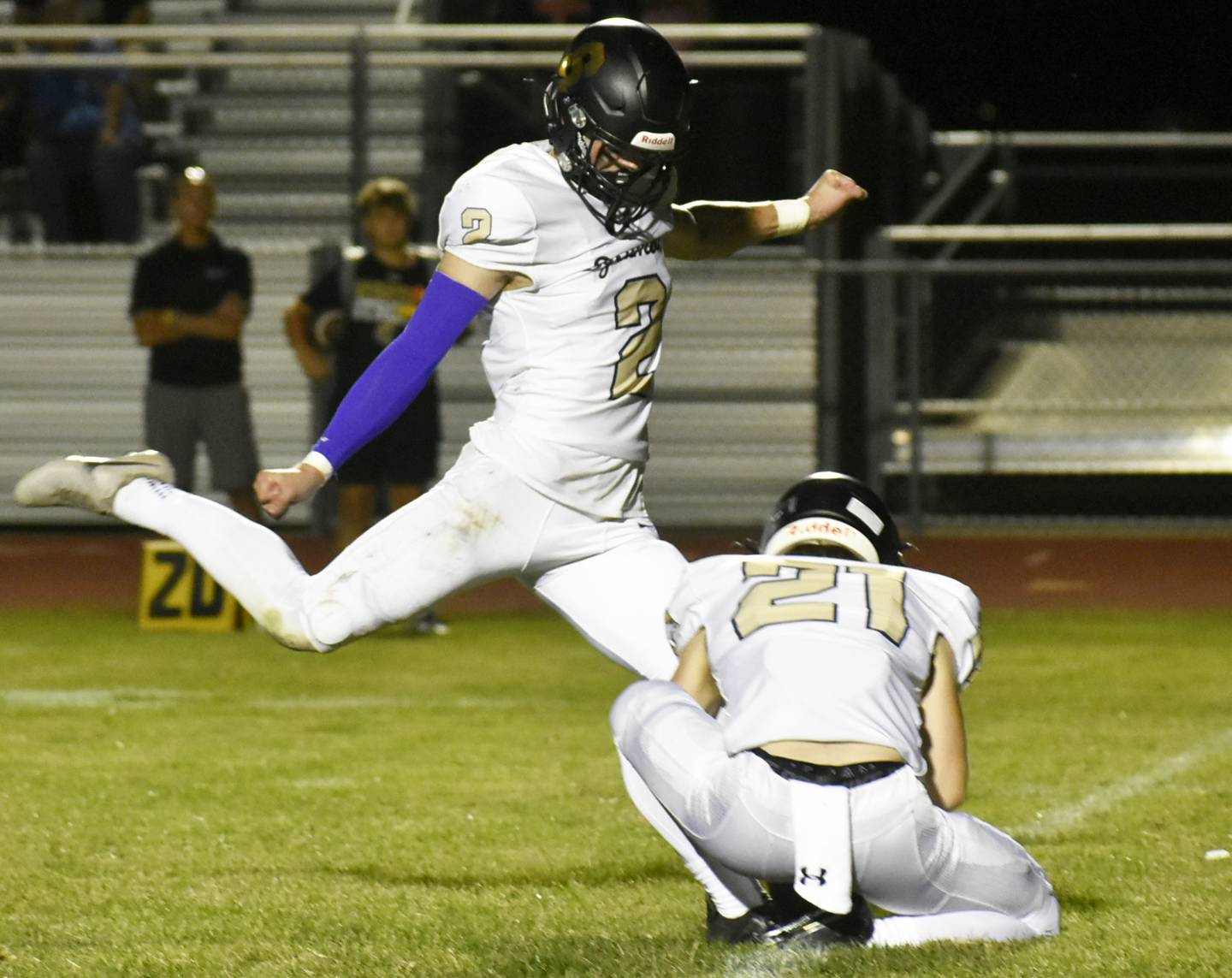 Sycamore’s Thatcher Friedrichs attempts an extra point during the Interstate 8 opener against Rochelle on Friday, Sept. 20, 2024.