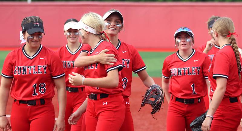 Huntley’s Red Raiders celebrate a win over DeKalb in IHSA Class 4A Sectional Semifinal softball action at Barrington High School in Barrington on Wednesday, June 4, 2025.