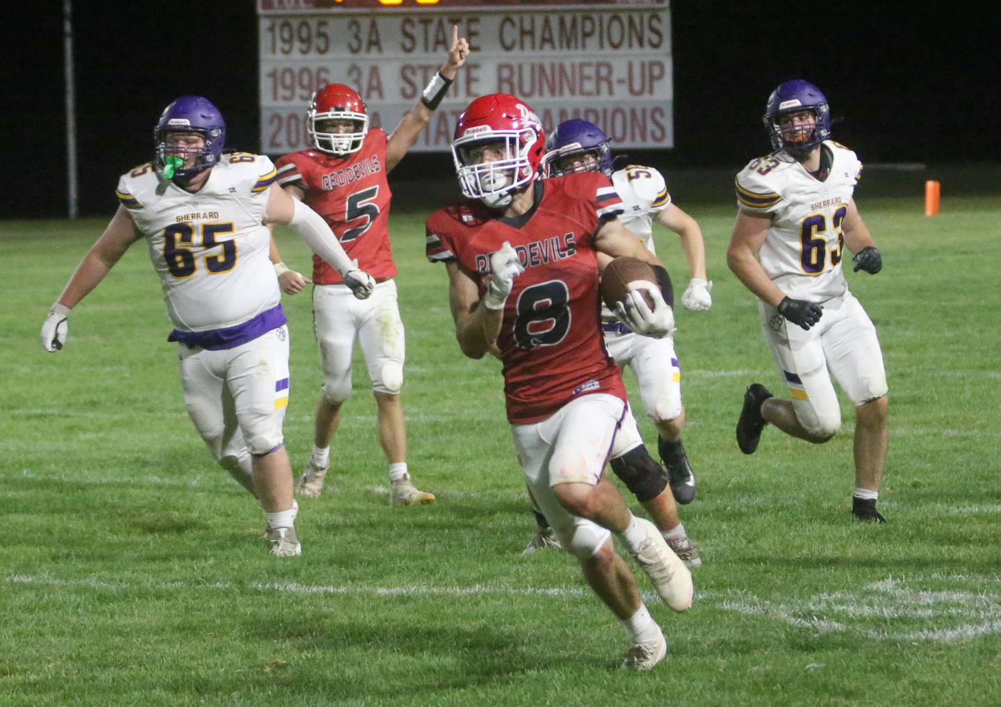 Hall-Putnam County's Braden Curran runs the ball against Sherrard on Friday, Sept. 19, 2025 at Richard Nesti Stadium.