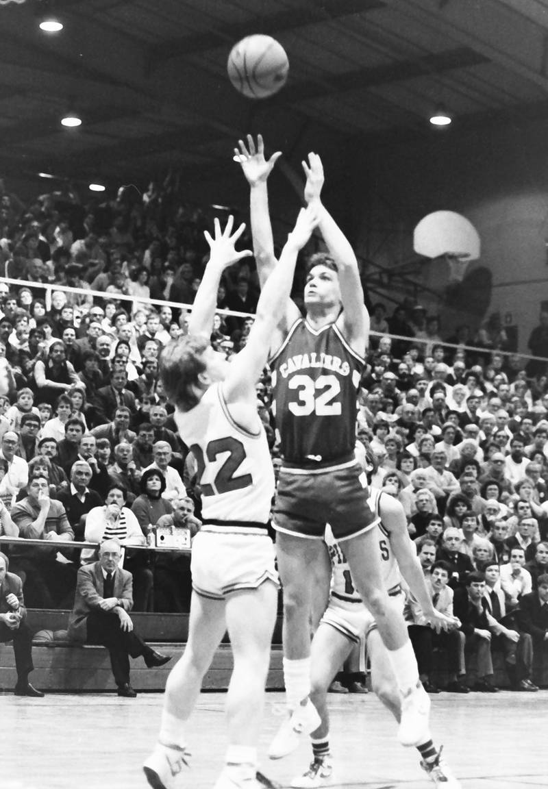 L-P's John Happ lets go of a shot over Ottawa's Brad Hartshorn during the Regional title game on Saturday, Feb. 28, 1986 at La Salle-Peru Township High School.