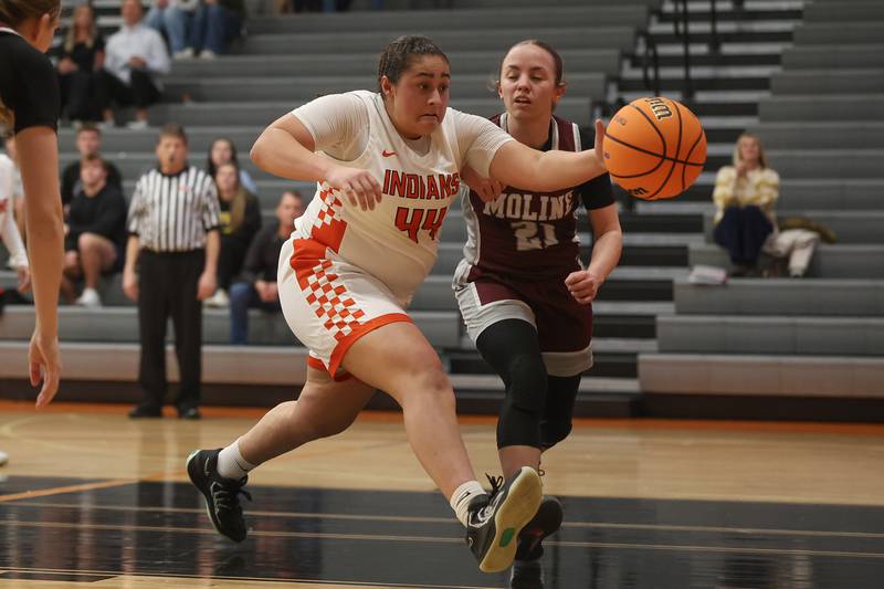Minooka’s Jaelle Hamilton runs down the loose ball against Moline in the Class 4A Minooka Regional championship game on Thursday, Feb. 19, 2026 in Minooka.