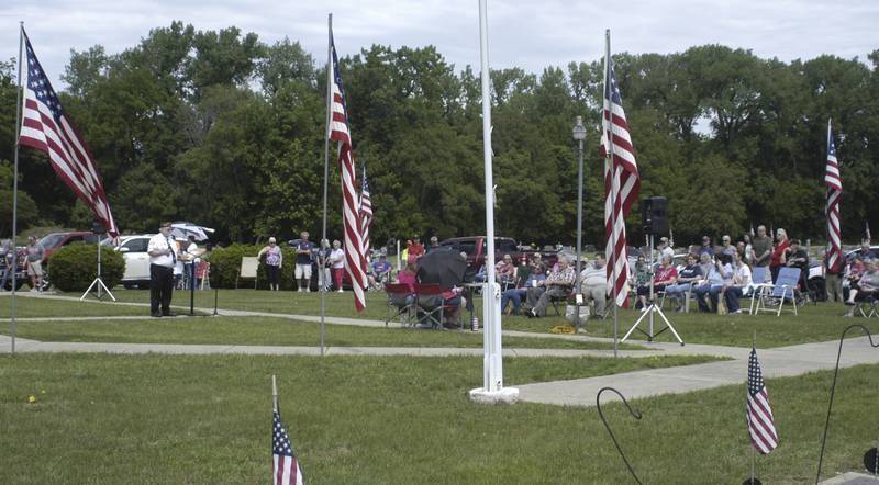 A crowd gathers for the ceremony at Coloma Township Cemetary for Memorial Day. Twin City American Legions marked Memorial Day with various events on Monday, May 25th, 2026. Events included a Rifle Volley, playing of Taps, a Memorial Day Service and an American Flag mural dedication.