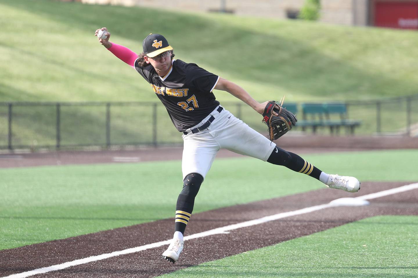 Joliet West’s James Love makes a throw to first against Joliet Central on Thursday, May 11, 2023 in Joliet.