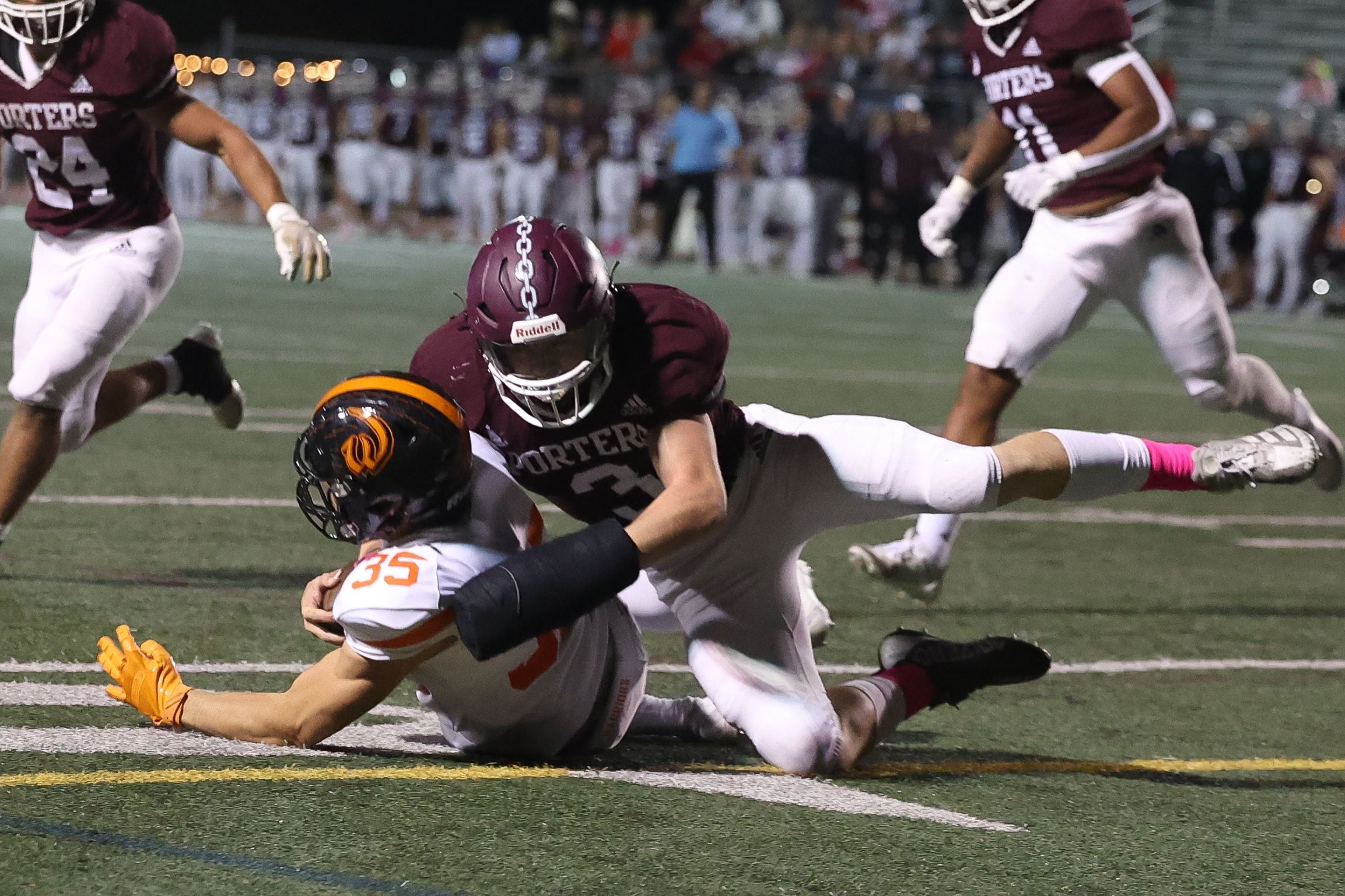 Lockport’s Colton Benaitis brings down the Lincoln-Way West punter in a contest last season.