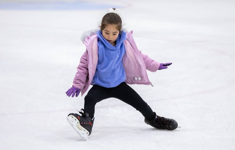 Farah Roosh, 5, loses her balance during open skate at Crystal Ice House in Crystal Lake on Friday, Jan. 3, 2025.