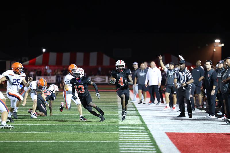 Bradley-Bourbonnais' Jamir Burt runs for a first down during the Boilermakers' victory over Stagg on Friday, Sept. 26, 2025.