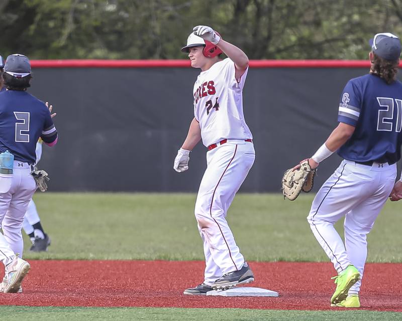 Yorkville's Bryce Baxa (24) pulls up at second for a double during baseball game between Oswego East at Yorkville. Monday, May 12, 2025 in Yorkville.