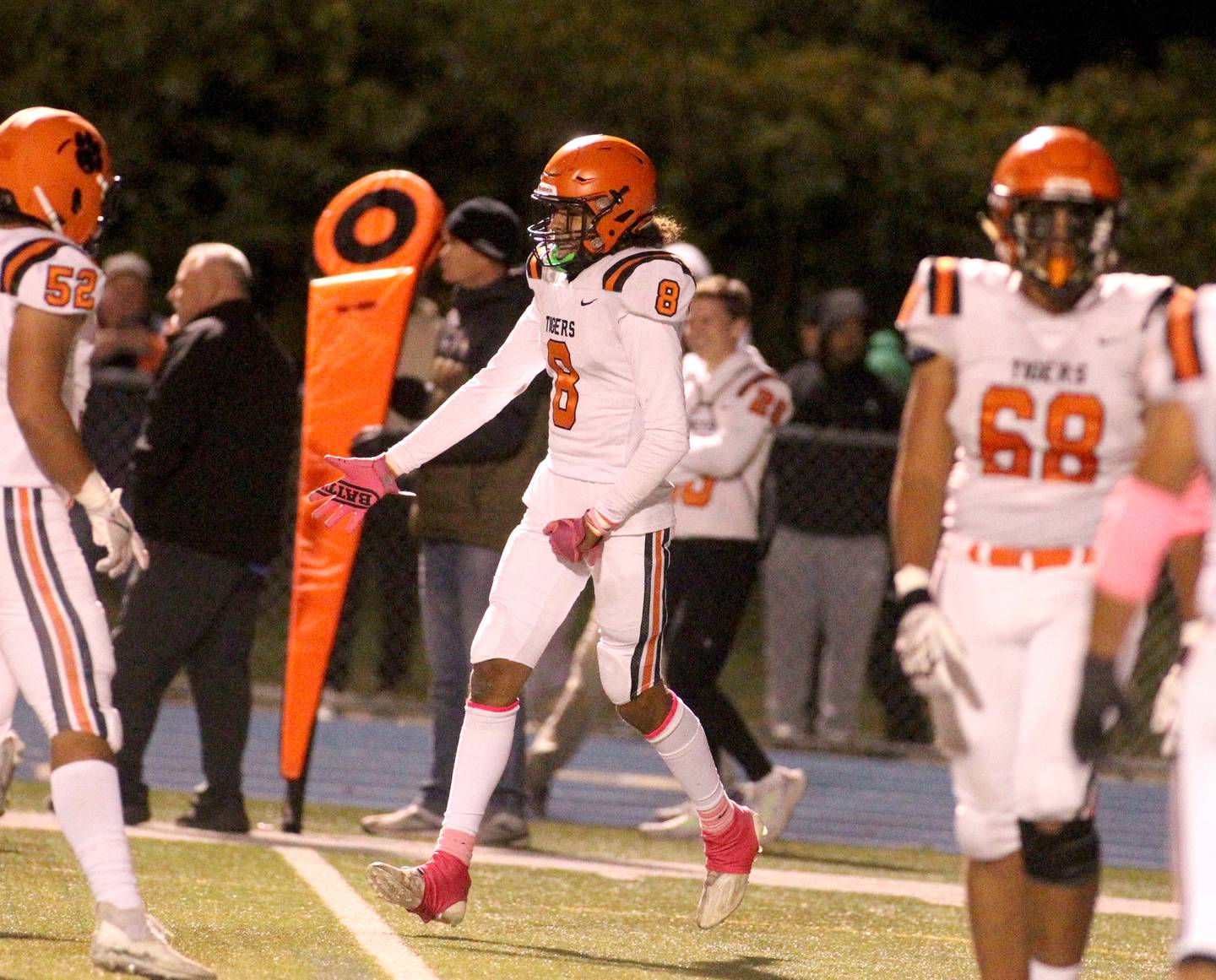 Wheaton Warrenville South’s Braylen Meredith (8) celebrates his touchdown during a game at Wheaton North on Friday, Oct. 7, 2022.