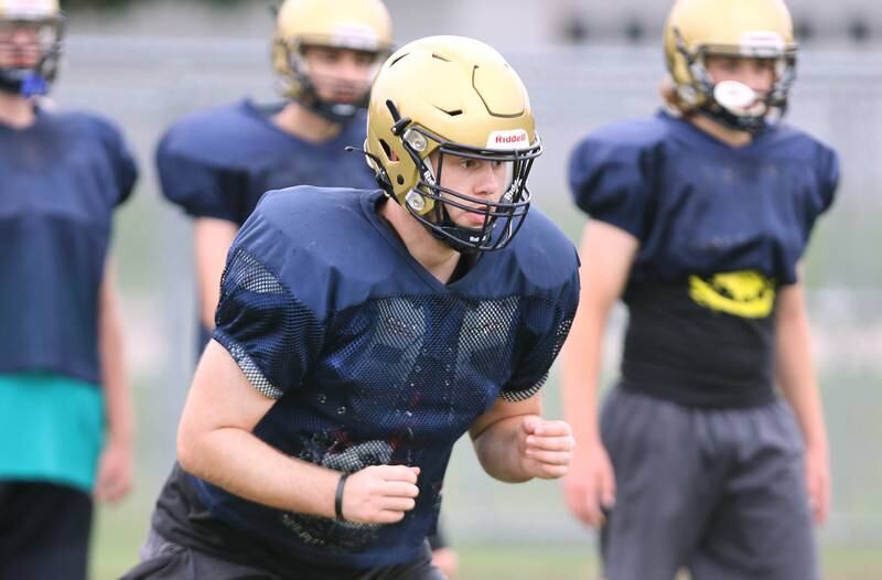 Hiawatha’s Zach Edwards works on a drill with the linemen during practice Wednesday, August 9, 2023, at the school in Kirkland.