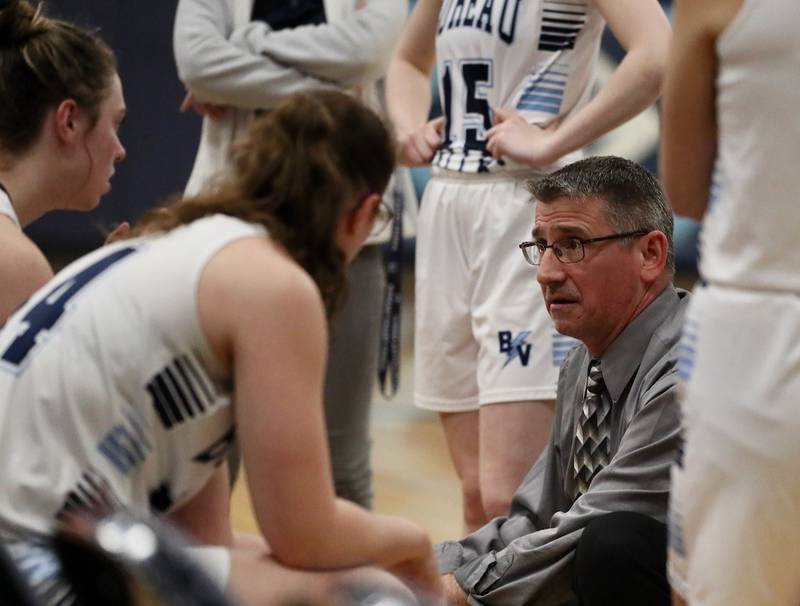 Bureau Valley coach Matt Wasilewski instructs his team during a timeout in Saturday's regional game at the Storm Cellar.