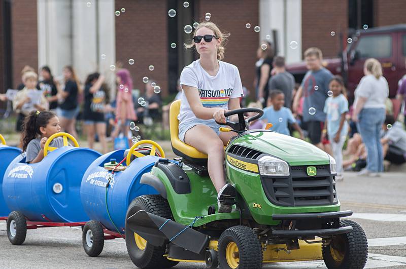 Amazing Grace Church's Fiesta Parade entry is a bubble-maker.