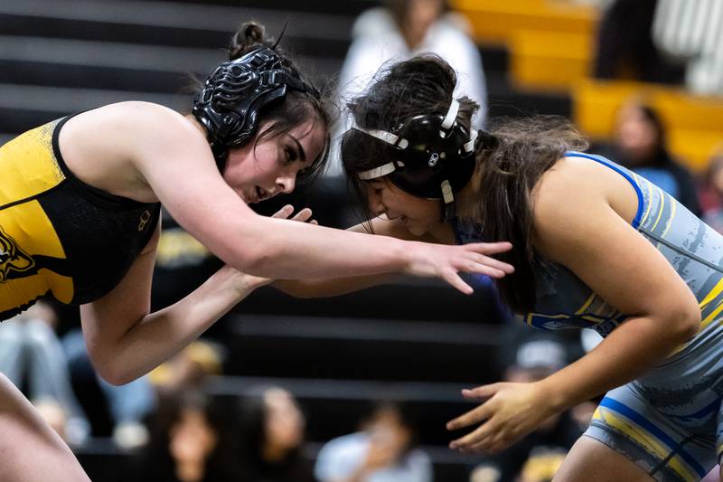 Joliet West’s Veronica Klobnak and Joliet Central’s Yaretzi Arenas compete in the 135 pound match at Joliet West on Jan. 12, 2026.