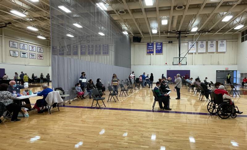 McHenry County residents in Phases 1b and 1b+ wait to be vaccinated at a pop-up clinic held in the gymnasium at McHenry County College Friday, Friday, March 26, 2021.
