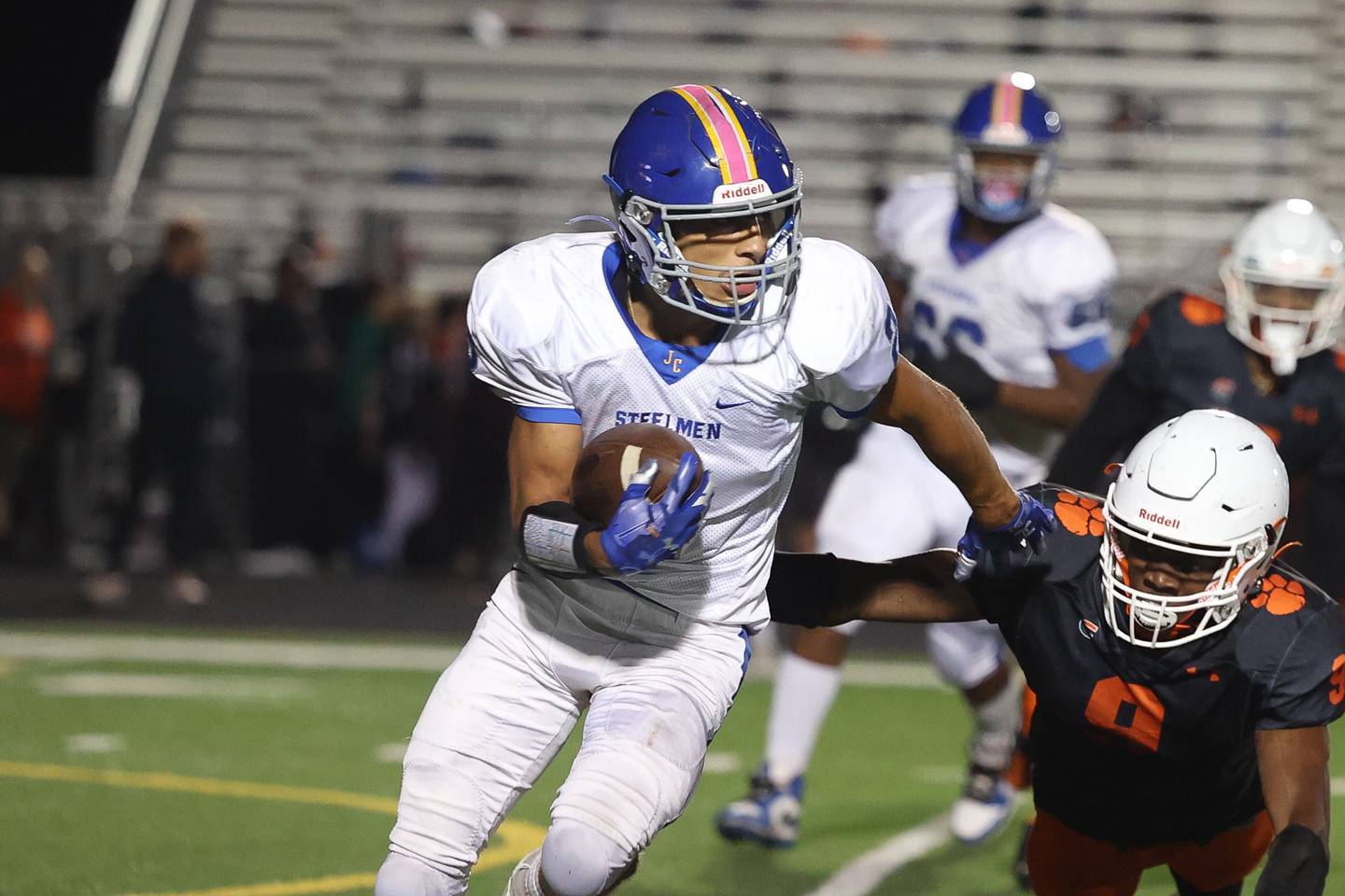 Joliet Central’s Christian Smith rushes to the outside against Plainfield East on Oct. 4, 20234 in Plainfield.