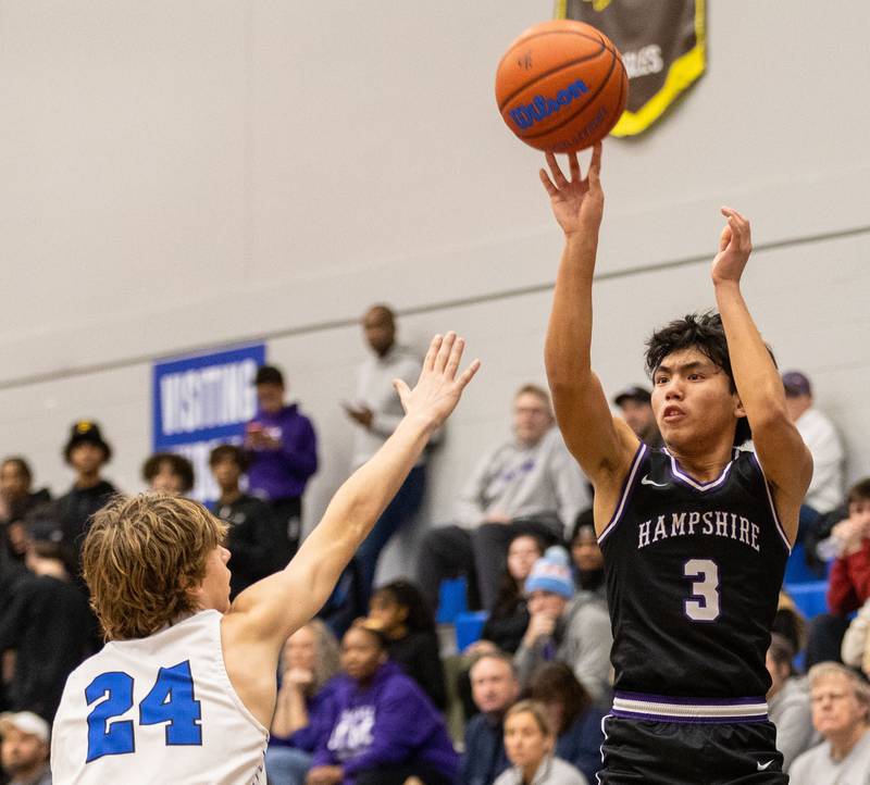 Hampshire senior Ryan Regalado (3) shoots a field goal during a game against Burlington Central High School on Friday, Dec. 22, 2023.