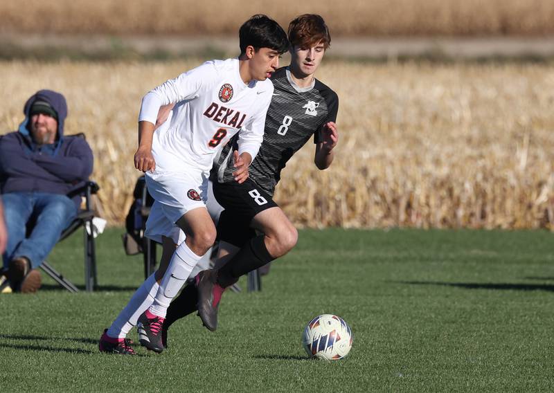 DeKalb's Joaquin Medina-Benitez and Kaneland's Josh Schimmel go after the ball during their game Thursday, Oct. 17, 2024, at Kaneland High School in Maple Park.