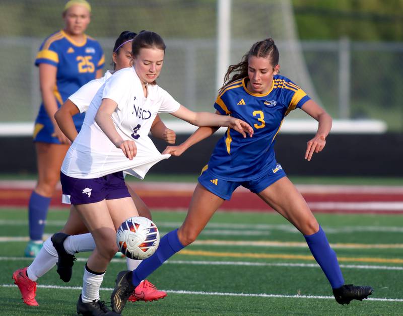 Johnsburg’s Charlie Eastland, right, battles North Shore Country Day’s Alexia Conine for the ball in IHSA Class 1A Sectional Title Game action at Richmond-Burton High School in Richmond on Tuesday, May 27, 2025.