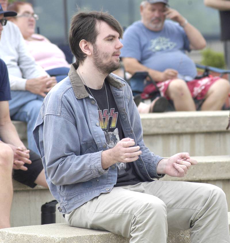 Dax Delhotal of Rock Fals rocks out to the Avey Grouws Band. Featurng four bands, the  Bellson Music fest was held on Saturday, June 7, 2025 at RB&W District Amphitheater in Rock Falls.