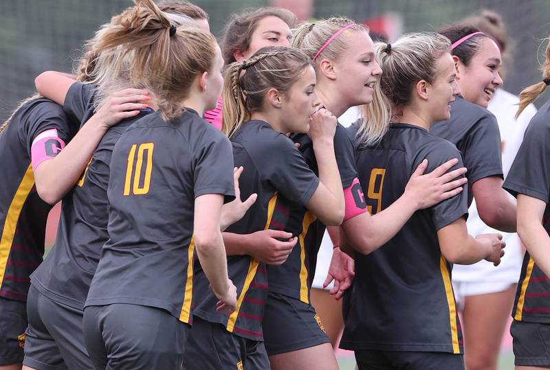 Richmond-Burton players leave the field all smiles after beating Montini 1-0 Friday, May 27, 2022, in their IHSA Class 1A state semifinal game at North Central College in Naperville.