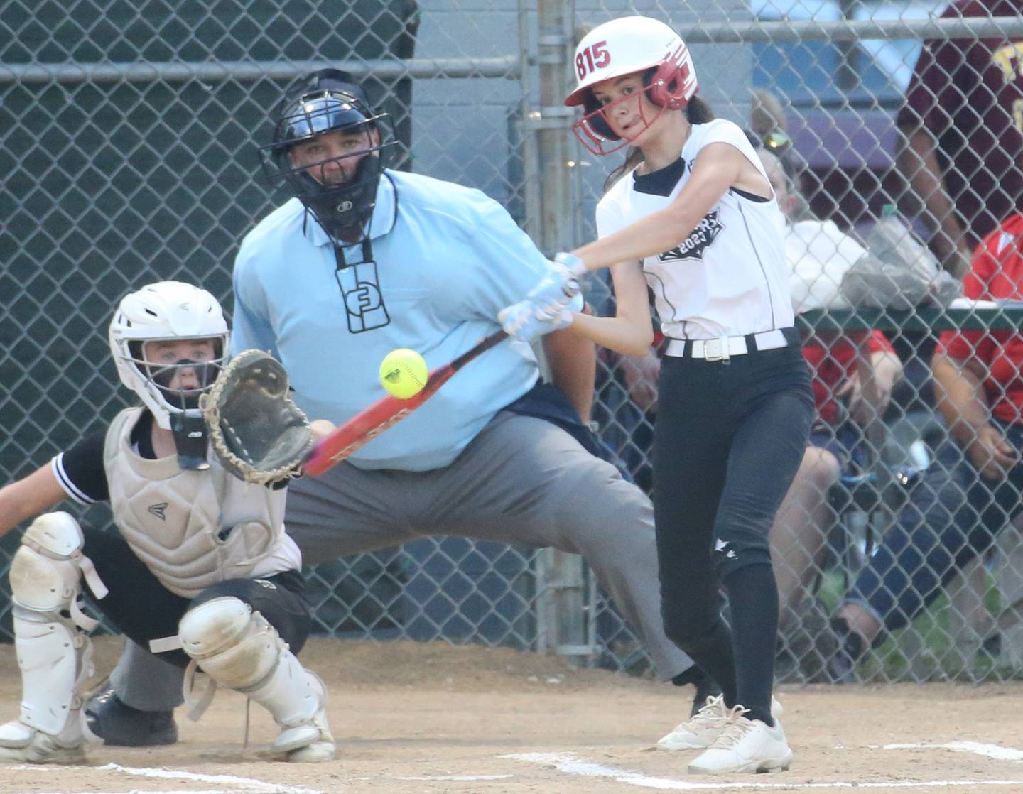 Spring Valley's Reese Baltikauski makes contact with the ball in the Minor League Softball State title game on Thursday, July 27, 2023 at St. Mary's Park in La Salle.